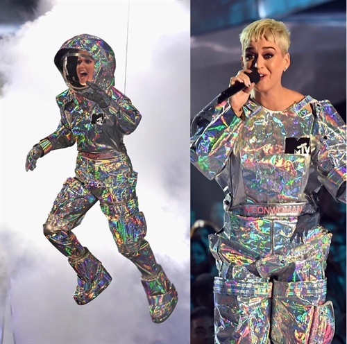 Moon woman and host Katy Perry flew in like a boss to open the VMAs
