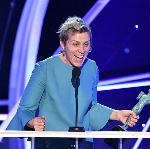 Frances McDormand in Valentino, Sam Rockwell in Prada 2