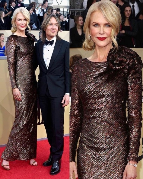 Nicole Kidman alongside husband Keith Urban - both in Armani