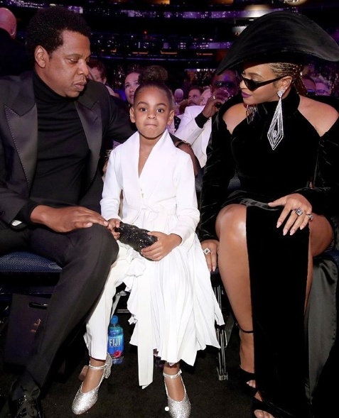 Beyonce in Nicolas Jebran and Jay Z sit front row alongside daughter Blue Ivy