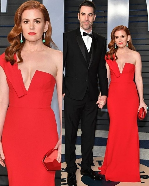 Isla Fisher in Alex Perry alongside husband Sacha Baron Cohen